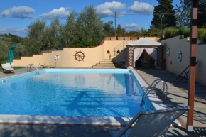 Отель Turignano Apartment  Монтеспертоли
